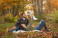 Family fun in autumn leaves - family photography in Breezy Point, Minnesota