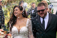 Bride and groom bubble exit at Pioneer Park in Stillwater, Minnesota