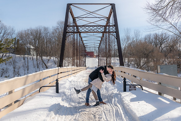 Surprise engagement on the Hanover Bridge in Hanover, Minnesota