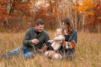 Family enjoying outdoor Fall photo session in Emily, Minnesota