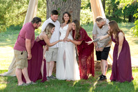Bridal party admiring the wedding ring in Breezy Point, Minnesota