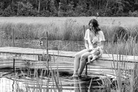 Mom and daughter on the dock - Family photography in Breezy Point, Minnesota